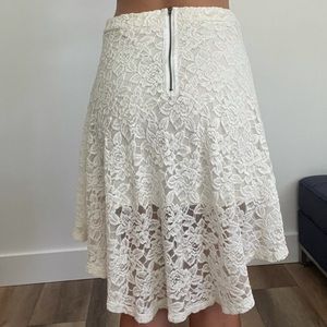 Midi off white lace skirt.